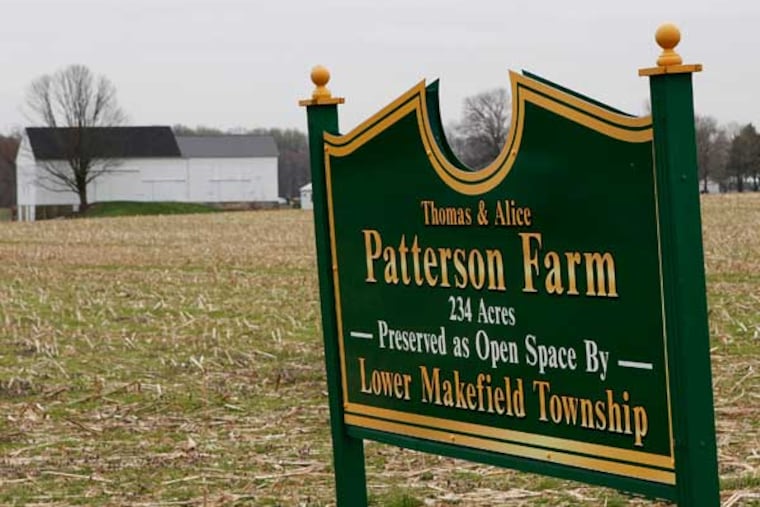 A sign on the Lower Makefield Township owned Patterson Farm which includes the Satherthwaite House and the 5.1 acres approved for sale. ( MICHAEL S. WIRTZ / STAFF PHOTOGRAPHER ).