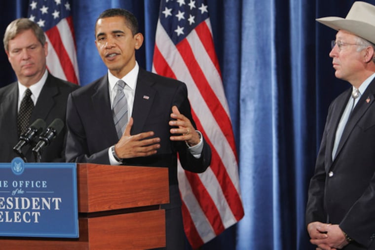 President-elect Barack Obama with cabinet choices Tom Vilsack (left) for Agriculture and Ken Salazar for Interior.
