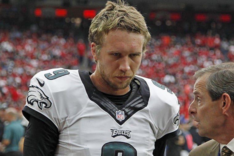 Eagles quarterback Nick Foles injured his shoulder against the Texans and did not return to the game. (Ron Cortes/Staff Photographer)