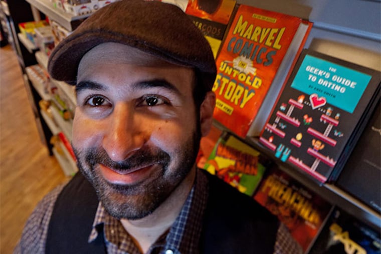 Eric Smith, author of "The Geek's Guide to Dating," at Brave New World comics. (David M Warren/Staff Photographer)