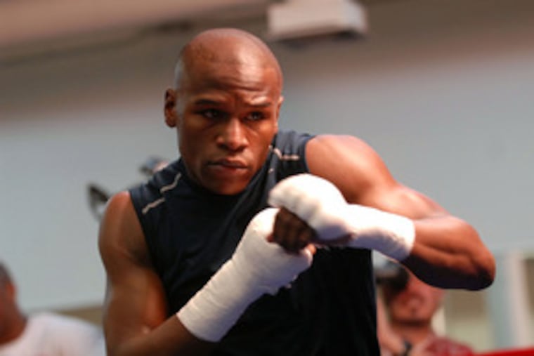 Floyd Mayweather Jr. and his chronically sore hands will meet Oscar De La Hoya on Saturday.