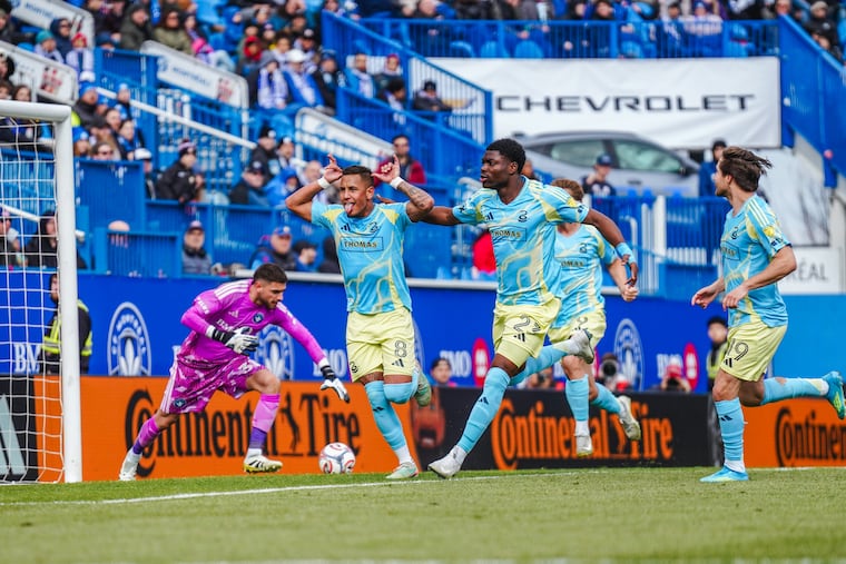 Jesús Bueno (second from left) celebrates with Ezekiel Alladoh and Indiana Vassilev after scoring a goal for the Union against Montréal on Saturday.