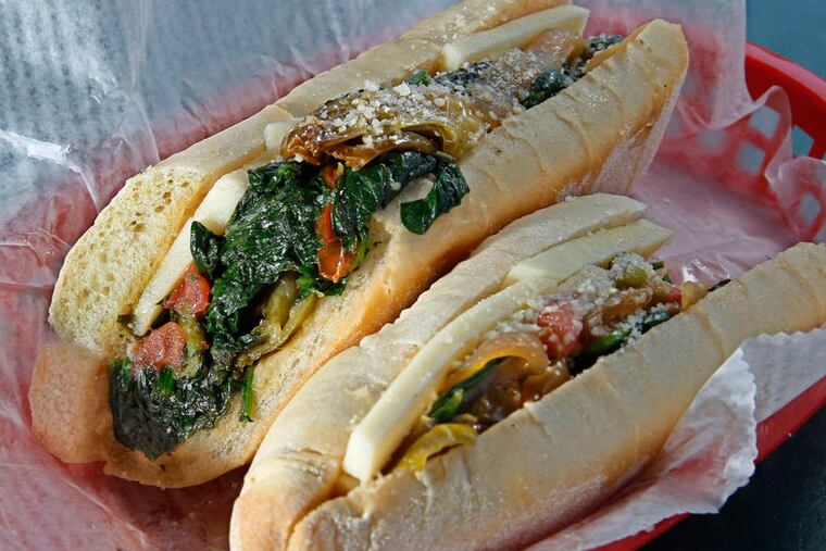 The Uncle Charlie’s sandwich, at the Sandwich Bar in Ocean City, a hot vegetarian hoagie filled with lots of juicy sautéed greens. ( Michael Bryant / Staff Photographer )