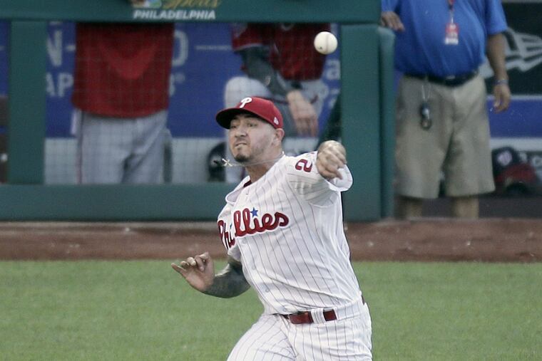 Phillies pitcher Vince Velasquez was hurt when Nat's Adam Eaton lined the ball sharply to Velasquez who knocked it down with his right hand then threw him out at first using his left hand. The out was the 3rd out of the 2nd inning and Velasquez then fell to the ground eventually getting up and leaving the Washington Nationals at Philadelphia Phillies Major League Baseball game at Citizens Bank Park in Phila., Pa. on June 30, 2018. ELIZABETH ROBERTSON / Staff Photographer