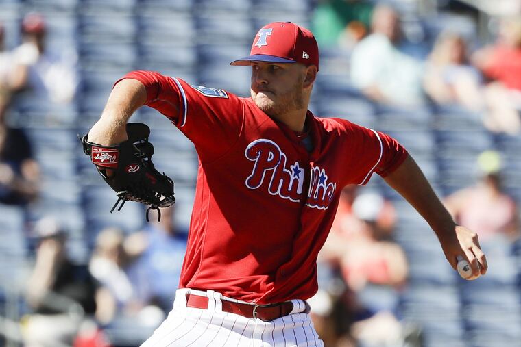 Phillies pitcher Cole Irvin throws a pitch during a spring training game.