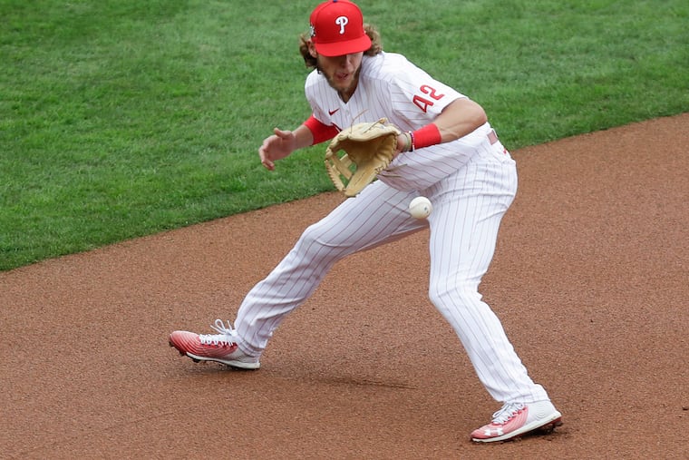 Phillies third baseman Alec Bohm fields the ball against the Atlanta Braves on Aug. 29 at Citizens Bank Park.