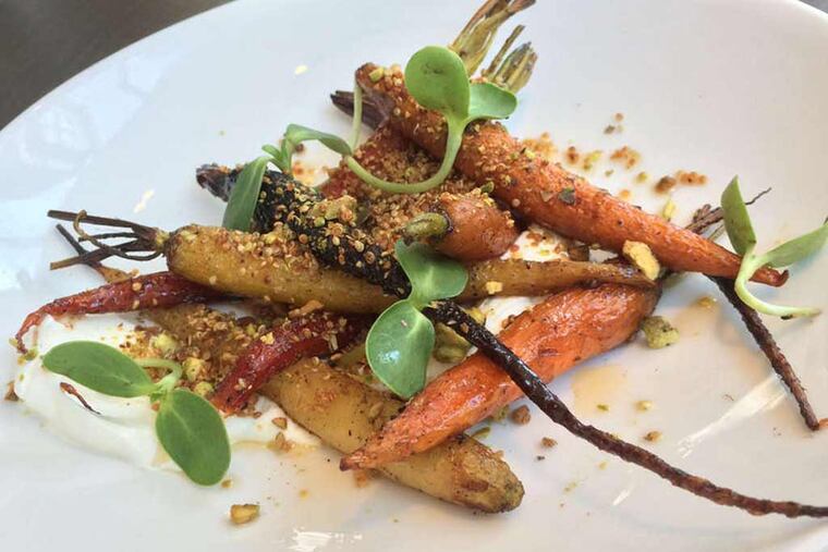 Roasted baby carrots with yogurt, chipotle pepper, honey, pistachios and toasted quinoa from Bank & Bourbon.