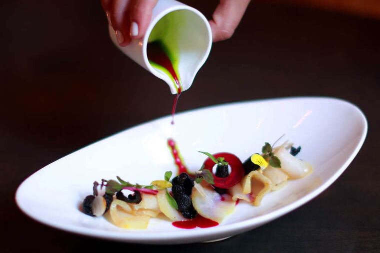 Cured cobia, with vadouvan curry spice and dashi broth infused with sweet beets at Treemont.