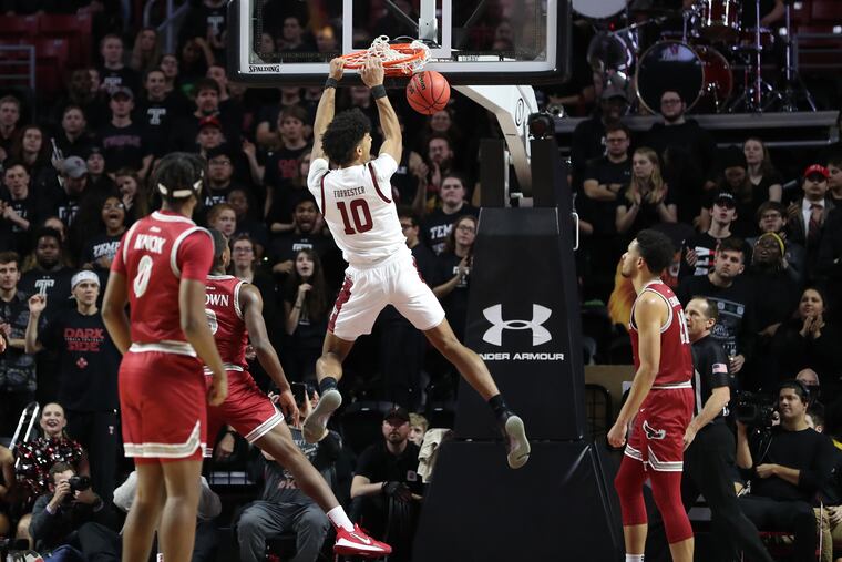 Jake Forrester dunks against St. Joseph’s.