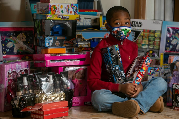 Rasul Bey, 7, of Philadelphia raised money to buy Christmas presents for low-income kids at his school.