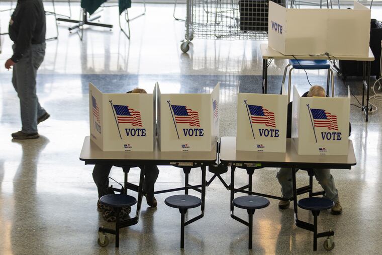 Voters in Bensalem High School for the Bucks County special election on Tuesday, March 17, 2020.