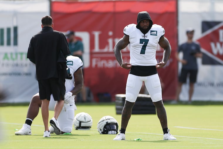 Eagles edge rusher Haason Reddick stretches during training camp at the NovaCare Complex on Tuesday.