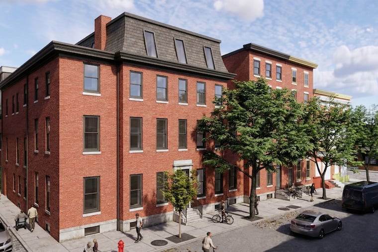 This sprawling complex of 19th century buildings at 15th and Waverly Streets is being converted to a 32-unit apartment building by LoDesign for developer Keith Alliotts. By installing a penthouse level over the former stable (rear left), the architects will be able to improve the interior circulation and increase the density.