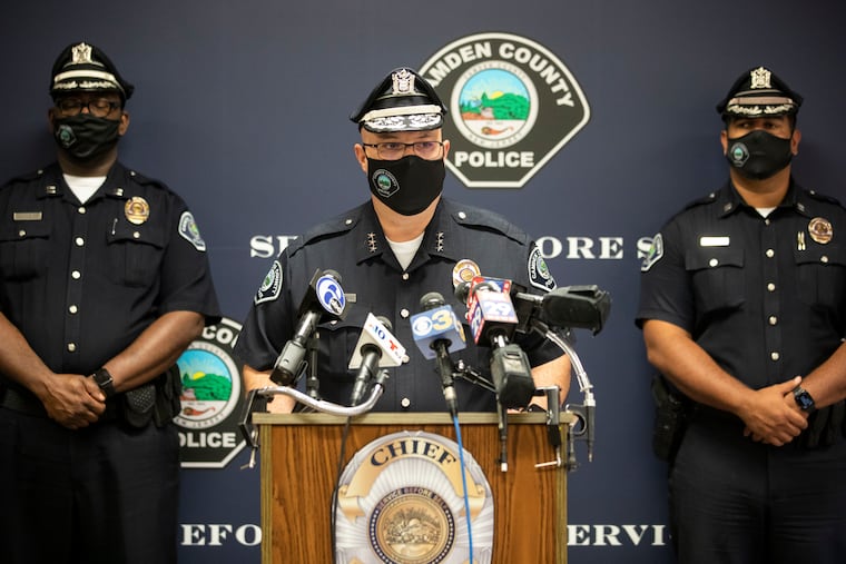 Camden County Police Chief Joseph Wysocki, center, during a news conference in early October about the arrests of four men in the September shooting of two Camden officers' home. On Tuesday, he announced that he will retire from the department at the end of the year.