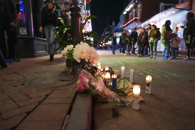A memorial on Bourbon Street in New Orleans on Friday sits at the site of a deadly truck attack on New Year's Day.