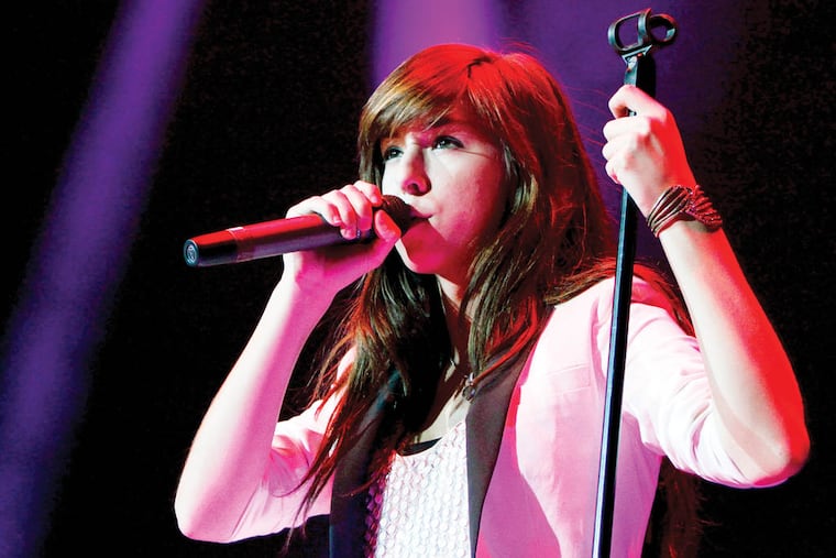 Pop artist Christina Grimmie opened for Selena Gomez on tour at Phillips Arena on Saturday, October 26, 2013, in Atlanta. (Photo by Dan Harr/Invision/AP Images)
