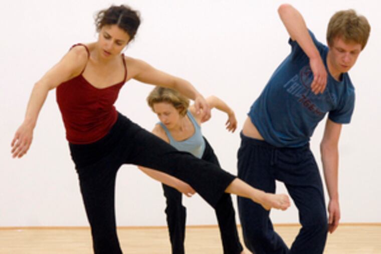Olive Prince (left) rehearses with Jillian Harris and Scott McPheeters.