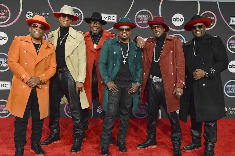 Michael Bivins (from left), Ronnie Devoe, Bobby Brown, Ricky Bell, Ralph Tresvant, and Johnny Gill of New Edition appear at the American Music Awards in Los Angeles in 2021. The group's "New Edition Way" tour comes to the Liacouras Center on Sunday, with Boyz II Men and Toni Braxton. (Photo by Jordan Strauss/Invision/AP, File)