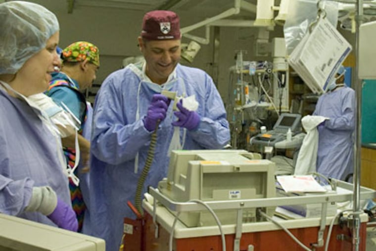 Dr. John Pryor, a surgeon at the University of Pennsylvania Trauma Center serving in Iraq, was killed Thursday when a mortar round hit near his living quarters. (Inquirer file photo)