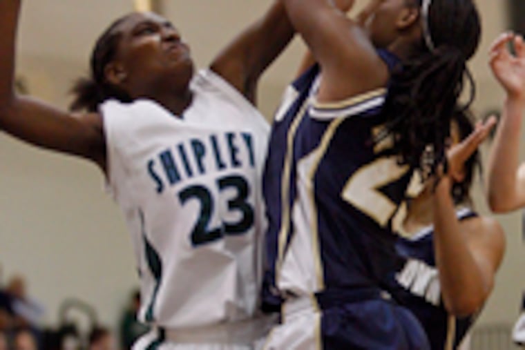 Shipley's Alex Lennon snuffs a shot by Germantown Friends' Talitha Smith. Lennon scored 23 points in the win.