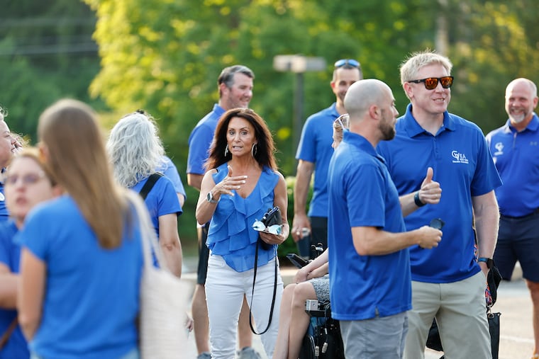 Teachers from Great Valley High School in Malvern gather before a school board meeting in 2024 following reports that middle schoolers had created 22 fake TikTok accounts impersonating educators.