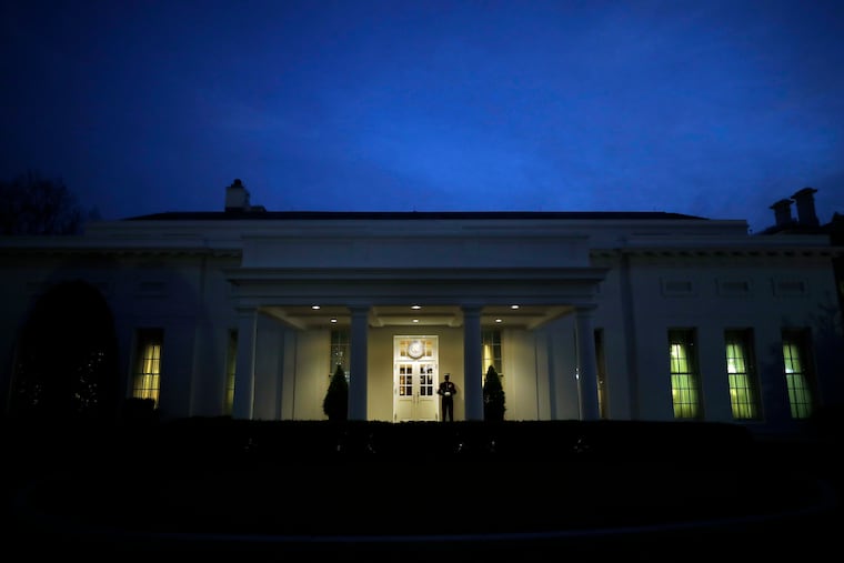 A Marine stands on duty outside the West Wing while President Donald Trump is in the Oval Office of the White House in Washington, D.C., on Jan. 11, 2021.