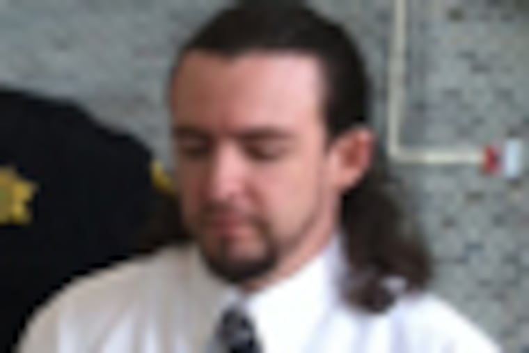 Walter Meyerle is escorted into court, where he was found guilty Tuesday of 170 counts of sexually abusing children, possessing child pornography and plotting to escape from jail. (Bill Reed/Staff)