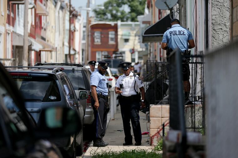 Police investigate a shooting in the 2500 block of North Gratz Street in North Philadelphia on Saturday where a 30-year-old man was shot twice in the head and was listed in extremely critical condition at Temple University Hospital.