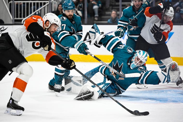 San Jose Sharks goaltender Alexandar Georgiev can't stop a shot by Flyers center Ryan Poehling.