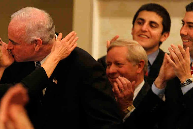Patrick Meehan kisses his wife, Carolyn, before addressing supporters at his victory celebration at the Springfield Country Club in Delaware County.