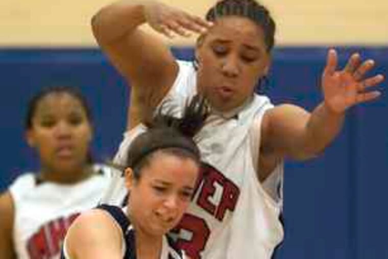 Springfield's Elise DiFilippo pursues an offensive rebound while being pursued in turn by Imhotep Charter's Khalisha Royal in the play-in contest.