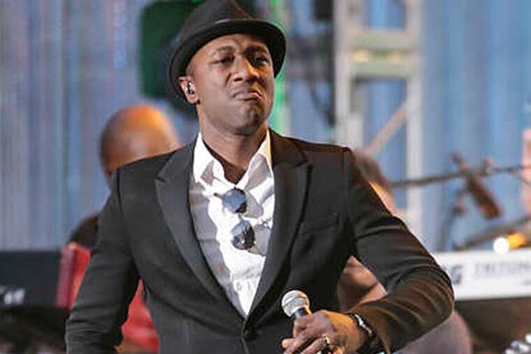 Aloe Blacc performs at the Wawa Welcome America Jam on the Parkway on July 4. In his solo work, the rapper-turned-singer has specialized in a healthy social commentary that stresses the importance of community. (ELIZABETH ROBERTSON / Staff Photographer)