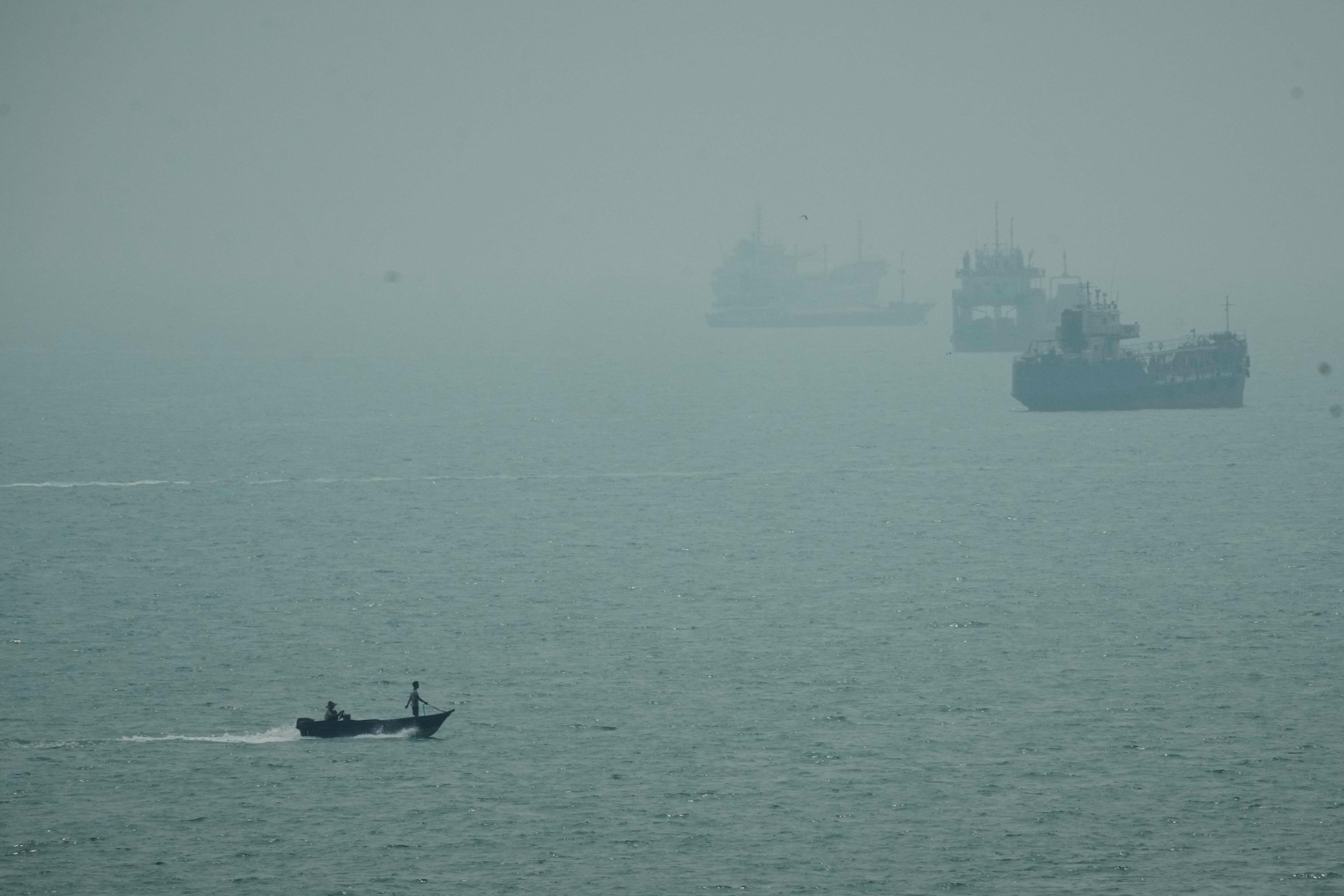 An Iranian commercial ship is struck near Strait of Hormuz with 1 dead, Iranian media say