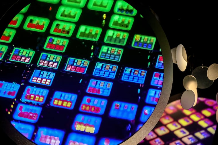 Images of semiconductor wafers at the Taiwan Semiconductor Manufacturing Co. Museum of Innovation in Hsinchu, Taiwan.