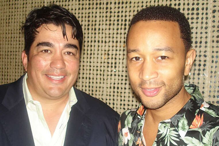 Jose Garces (left) and John Legend at Bar Volvér after the show at the Kimmel Center.