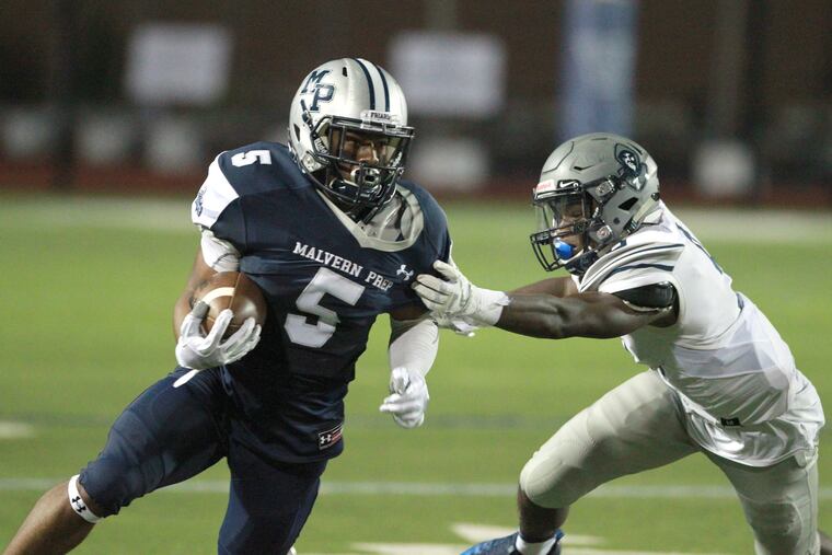 Jaylen DoCoteau (right) of St. Augustine Prep is a Kent State recruit as a defensive back.