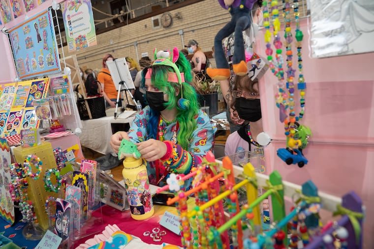 A vendor staffing their booth at a previous Trans Art Market. The next market takes place Sunday, Dec. 10 at the Bok Building.