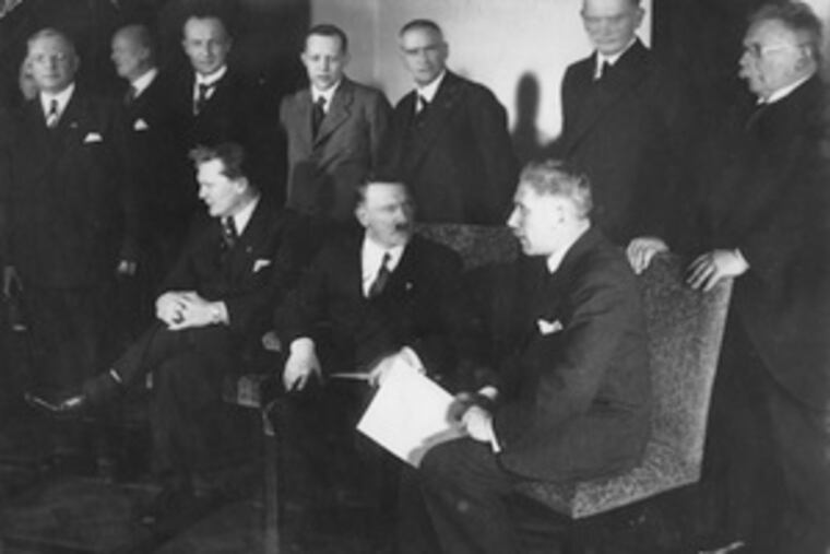 In a photograph from Berlin , Jan. 30, 1933, the ministers of the new cabinet of Germany's new chancellor, Adolf Hitler, gathered.