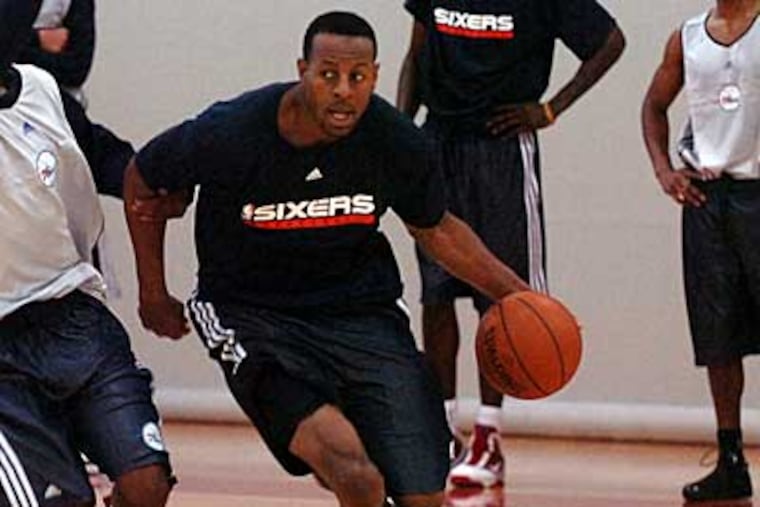 Andre Iguodala dribbles up the court during a Sixers practice earlier this week. (Sarah J. Glover / Staff Photographer)