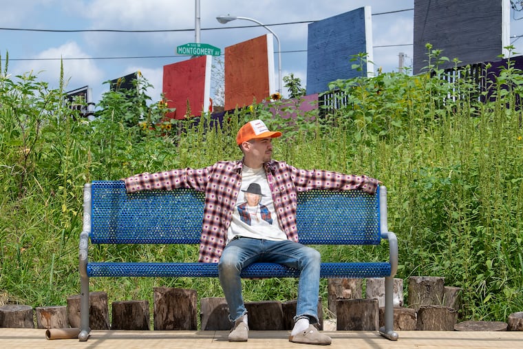 Philly hip-hop artist Alexander Charles at Sunflower Hill near his home in Philadelphia. Charles, who was brought up by his adoptive parents in Bucks County and has been making and recording music since age 15, has a new album,'Fortune Cookies.' It reflects his having discovered that he has a biological sister, and has embraced the Asian heritage they share -- and about which he had long been unaware.