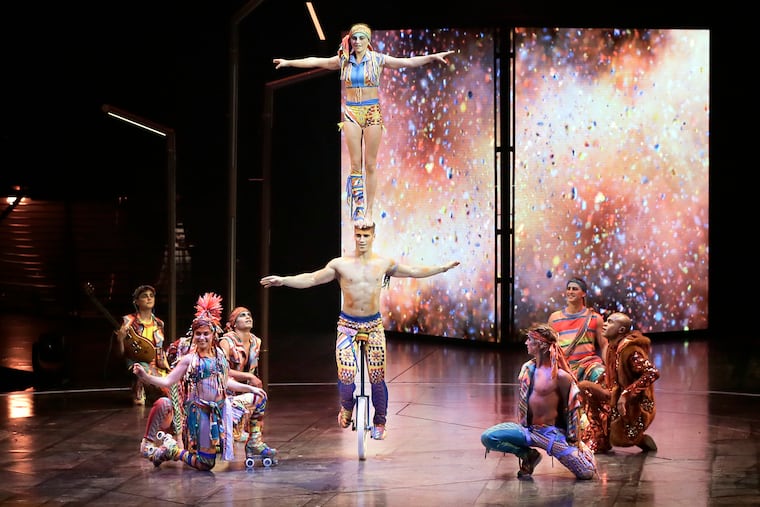 Two acrobats perform while rolling on a unicycle during opening night at Cirque du Soleil's Volta show in Oaks.