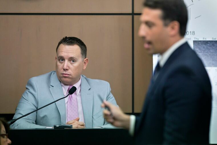 Jupiter Police Detective Andrew Sharp is questioned by Alex Spiro, right, attorney for New England Patriots owner Robert Kraft, during a motion hearing in the Kraft prostitution solicitation case, Wednesday, May 1, 2019, in West Palm Beach, Fla. Kraft's attorneys argue that undercover surveillance videos allegedly showing their client paying for sex at a Jupiter day spa should be ruled inadmissible and the evidence thrown out. (Lannis Waters/Palm Beach Post via AP, Pool)