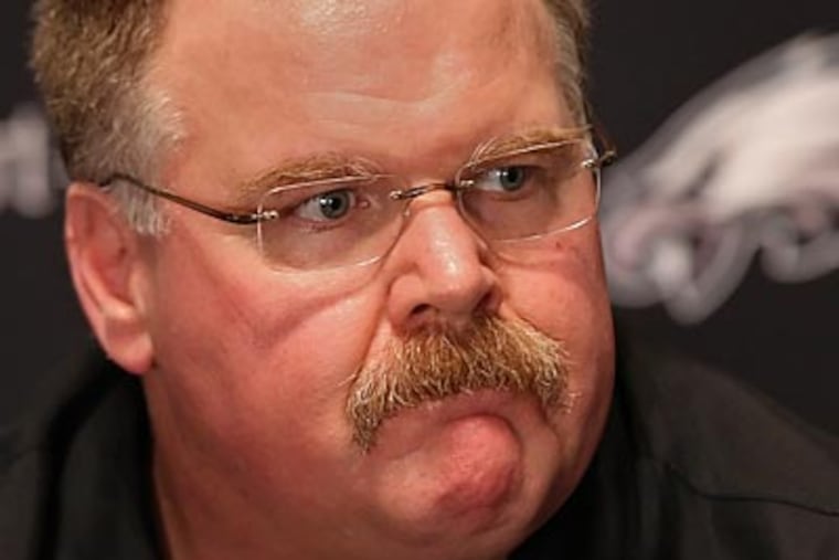 Andy Reid introduced Juan Castillo as the Eagles' new defensive coordinator Wednesday. (Steven M. Falk/Staff Photographer)
