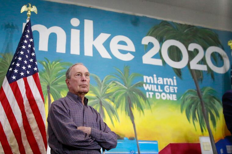 Democratic presidential candidate former New York City Mayor Mike Bloomberg waits to speak at a news conference, in the Little Havana neighborhood, in Miami.