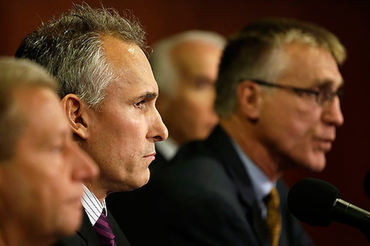 From left, new Flyers coach Craig Berube and GM Paul Holmgren. (AP Photo/Matt Slocum)