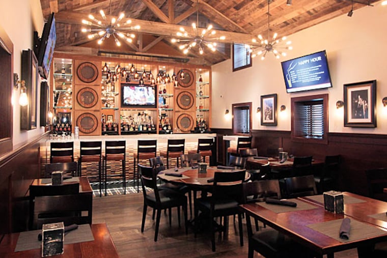 Second-floor bar and dining room at Taphouse 23.