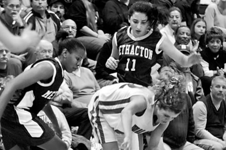 Methacton's Renee Womack and Ali Hammond (right) chase the ball during a playoff game. Womack has moved on to Penn State; Hammond returns this season