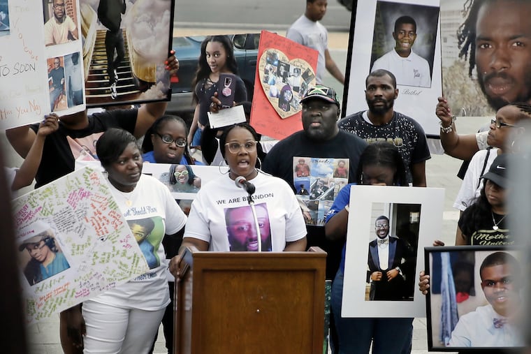 People impacted by gun violence make their presence known during the fourth annual "Fill The Steps Against Gun Violence" gathering at the Art Museum in May 2019.