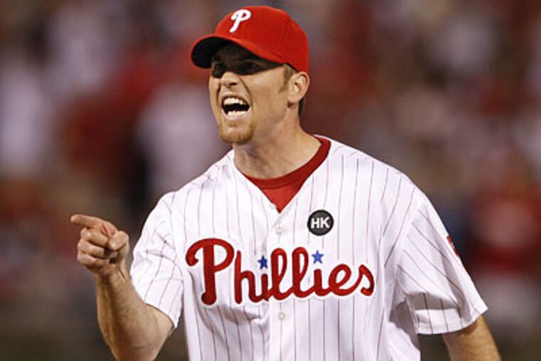 Brad Lidge pitched a 1-2-3 ninth inning to close out the Phillies' 3-2 win over the Braves. (Ron Cortes / Staff Photographer)