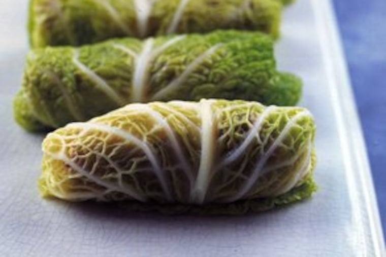 Holishkes are the Romanian version of stuffed cabbage that, in Briton Clarissa Hyman's book, are made with beef or lamb wrapped in savoy cabbage and cooked with lemon and brown sugar.